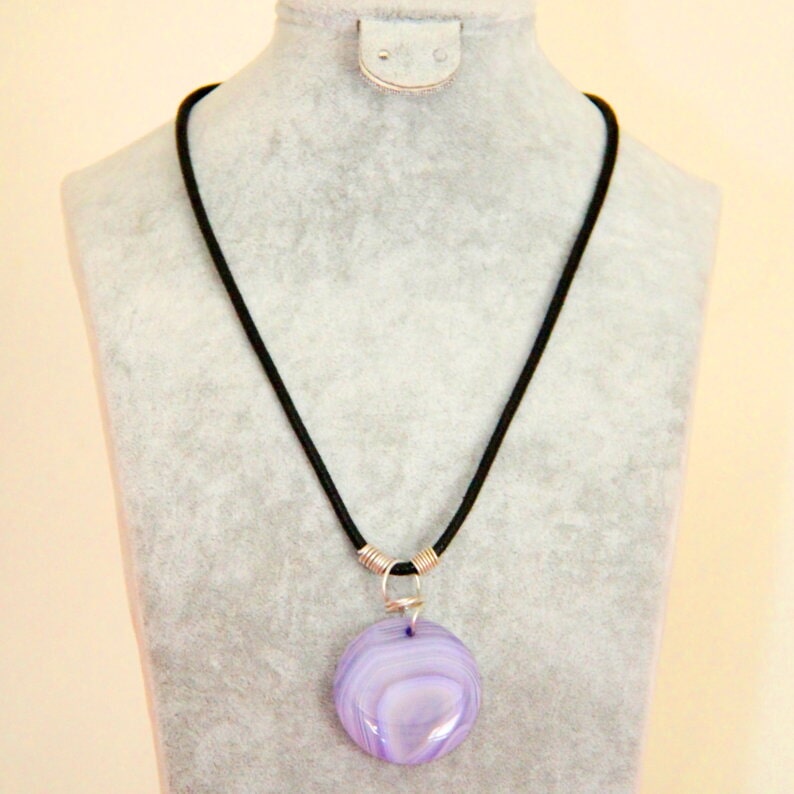 Pale purple circular pendant